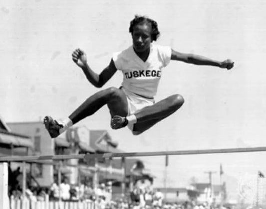 Alice Marie Coachman winning high jump event, US National Women’s Track and Field meet, 1939